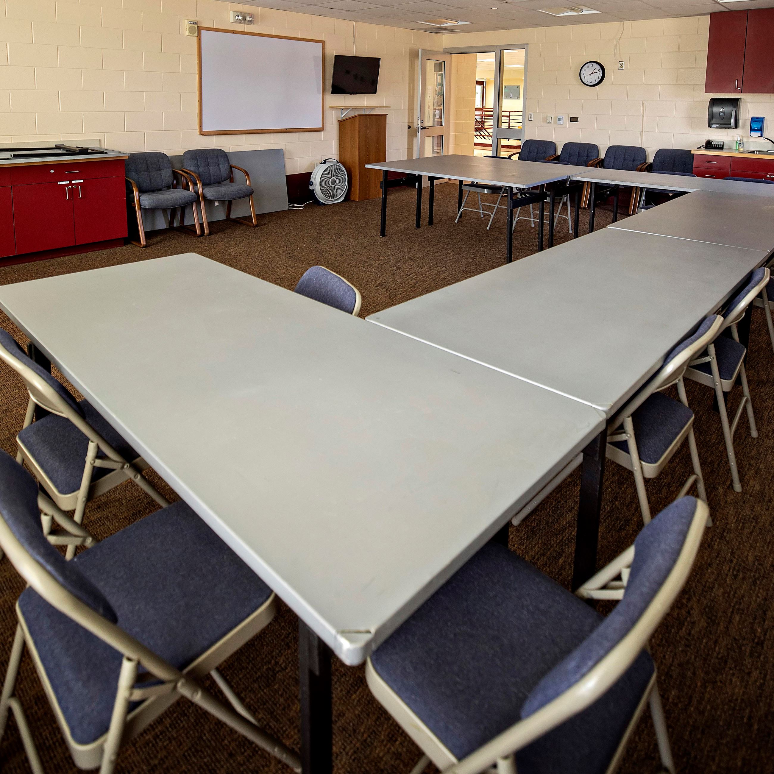 Meeting room at the Aquatic Center with tables and chairs