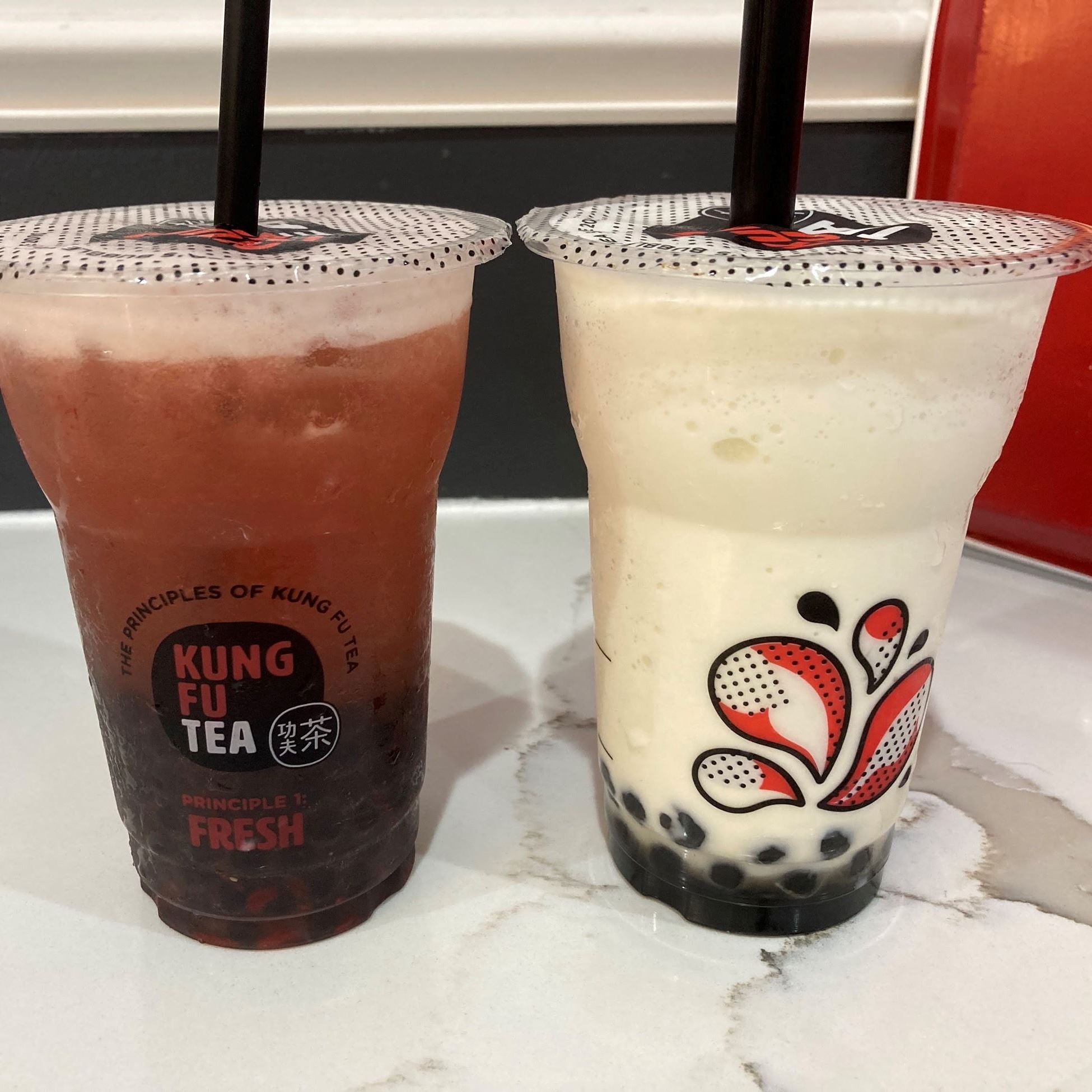 Two cups of bubble tea from Kung Fu Tea